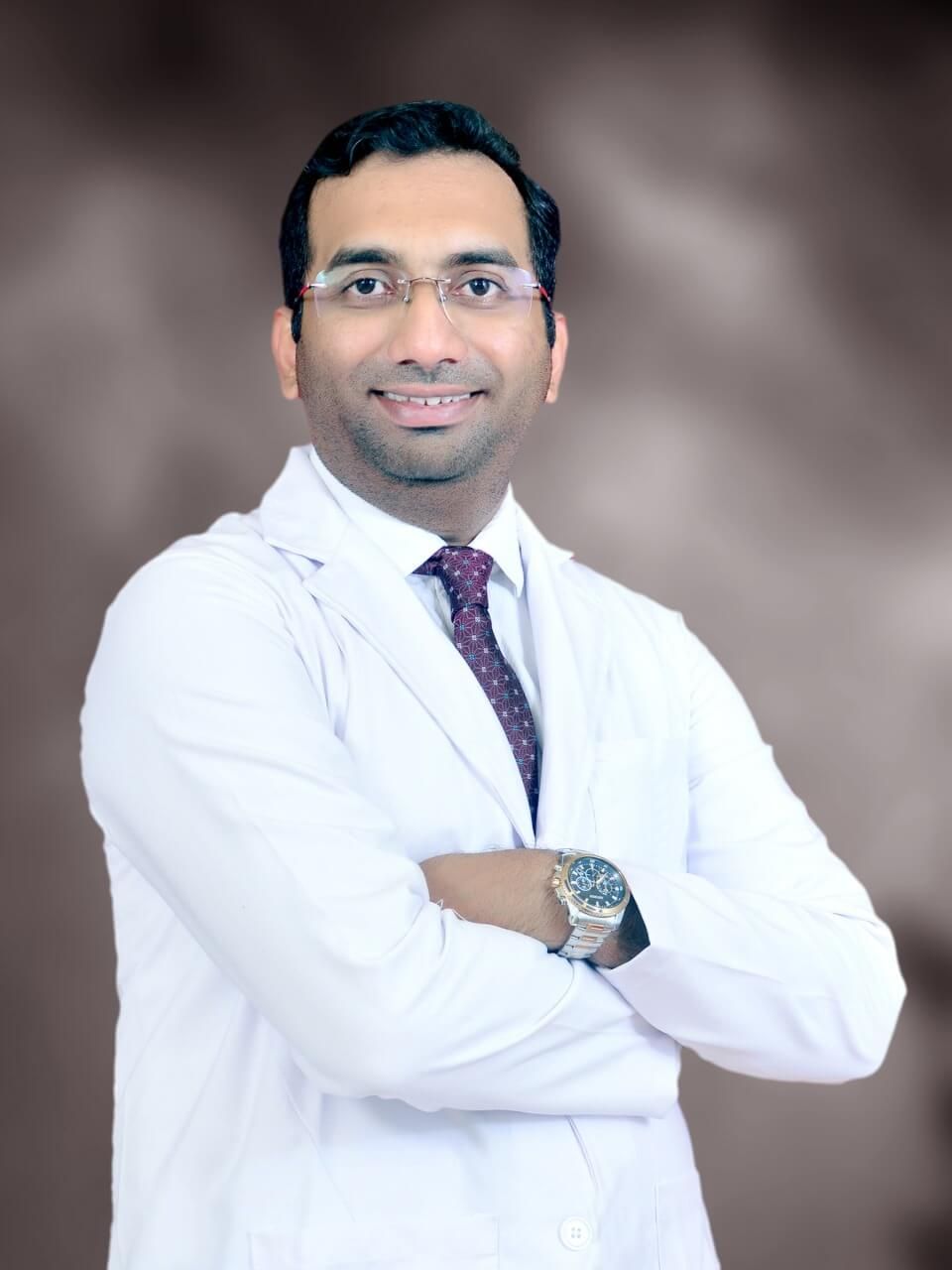 Dr. Shriniket Sawarkar in a white coat